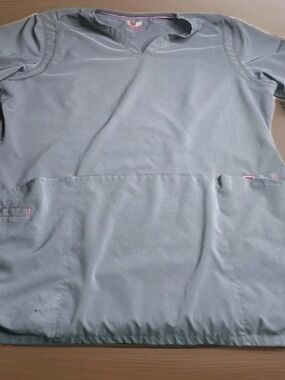 smitten gray scrub top with pink accents